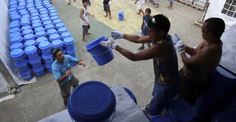 volunteers arranging relief goods