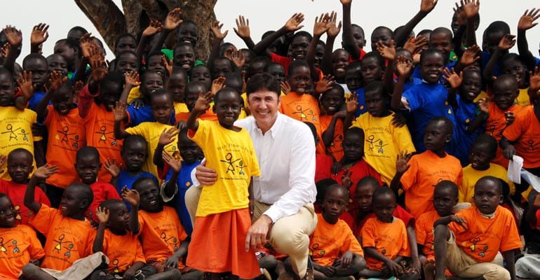 Lawrence Sizemore with African children
