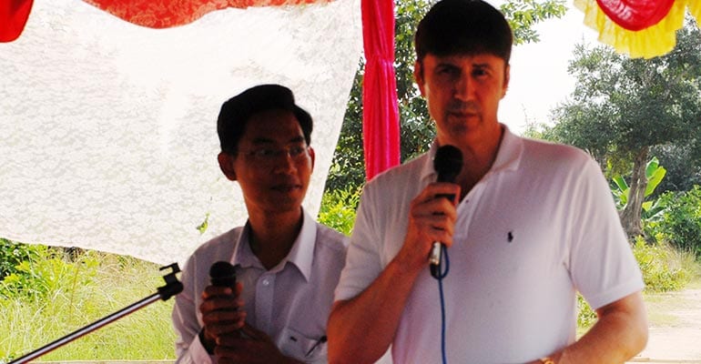 Lawrence Sizemore speaking to a crowd using a microphone